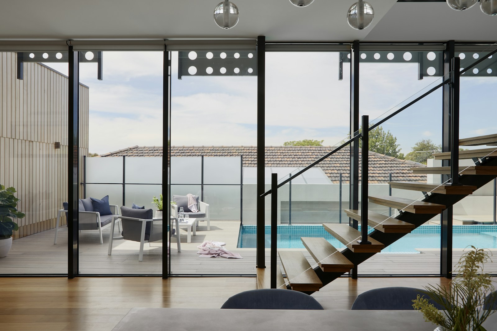 Side-by-side comparison of professional real estate photography and AI-enhanced editing result